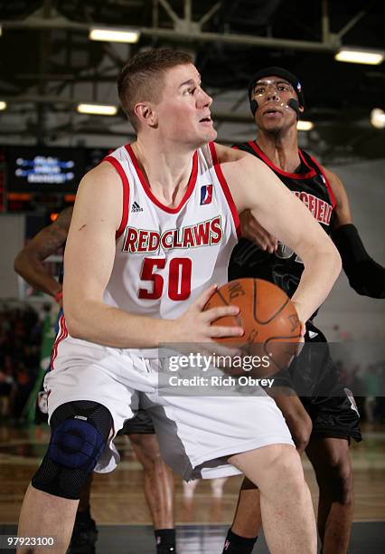 Paul Davis of the Maine Red Claws sets himself for an inside shot while guarded by Dante Milligan of the Springfield Armor during the game on March...