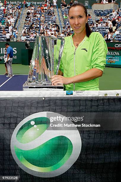 Jelena Jankovic of Serbia poses for photographers after defeating Caroline Wozniacki of Denmark during the final of the BNP Paribas Open on March 21,...