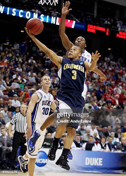 Jerome Randle of the California Golden Bears drives past Nolan Smith of the Duke Blue Devils during the second round of the 2010 NCAA men's...
