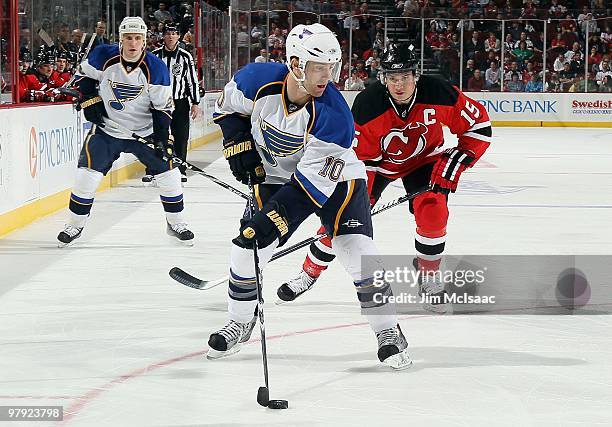 Andy McDonald of the St. Louis Blues skates against the New Jersey Devils at the Prudential Center on March 20, 2010 in Newark, New Jersey. The Blues...