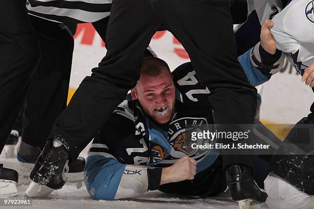Nick Tarnasky of the Florida Panthers fights with Zenon Konopka of the Tampa Bay Lightning at the BankAtlantic Center on March 21, 2010 in Sunrise,...