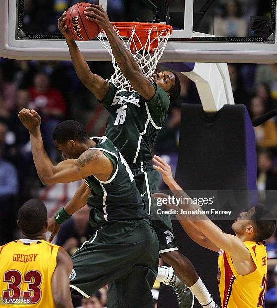 Durrell Summers of the Michigan State Spartans shoots over Greivis Vasquez of the Maryland Terrapins during the second round of the 2010 NCAA men's...