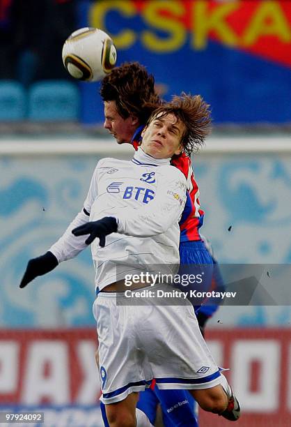 Georgi Shchennikov of PFC CSKA Moscow battles for the ball with Aleksandr Kokorin of FC Dynamo Moscow during the Russian Football League Championship...