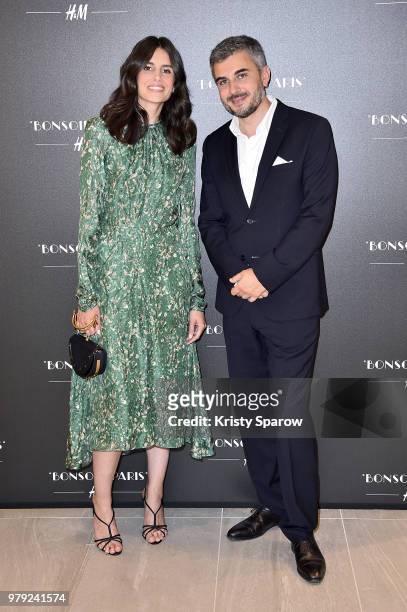Guest and Thomas Lourenco attend the H&M Flagship Opening Party as part of Paris Fashion Week on June 19, 2018 in Paris, France.