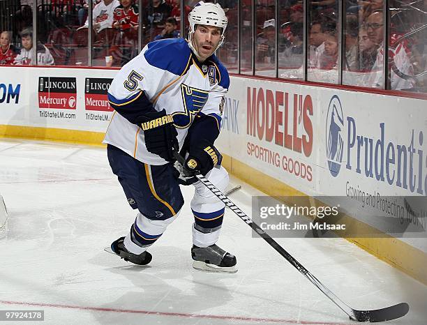 Barret Jackman of the St. Louis Blues skates against the New Jersey Devils at the Prudential Center on March 20, 2010 in Newark, New Jersey. The...