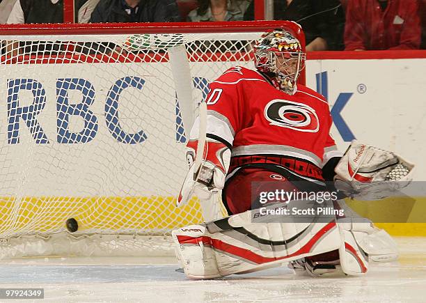 Justin Peters of the Carolina Hurricanes lets one of four shots get past him before being pulled against the Buffalo Sabres during their NHL game on...