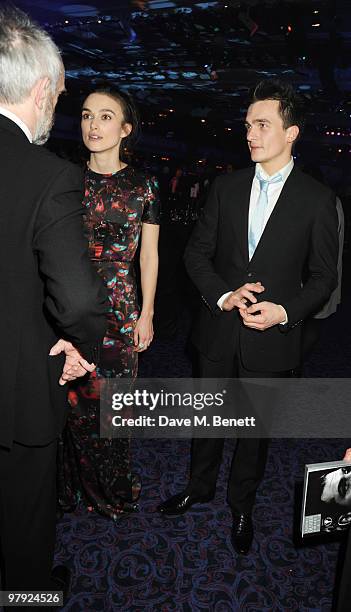 Keira Knightley, Rupert Friend and Jonathan Pryce attend The Laurence Olivier Awards, at the Grosvenor House Hotel on March 21, 2010 in London,...