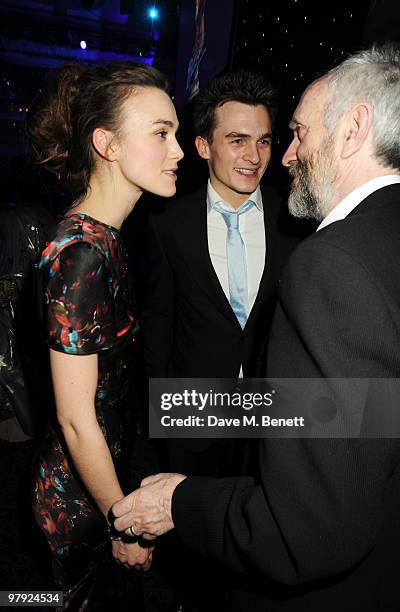 Keira Knightley, Rupert Friend and Jonathan Pryce attend The Laurence Olivier Awards, at the Grosvenor House Hotel on March 21, 2010 in London,...