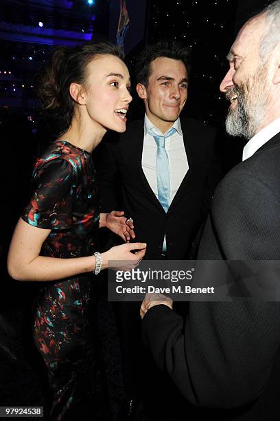 Keira Knightley, Rupert Friend and Jonathan Pryce attend The Laurence Olivier Awards, at the Grosvenor House Hotel on March 21, 2010 in London,...