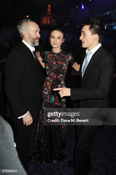 Keira Knightley, Rupert Friend and Jonathan Pryce attend The Laurence Olivier Awards, at the Grosvenor House Hotel on March 21, 2010 in London,...