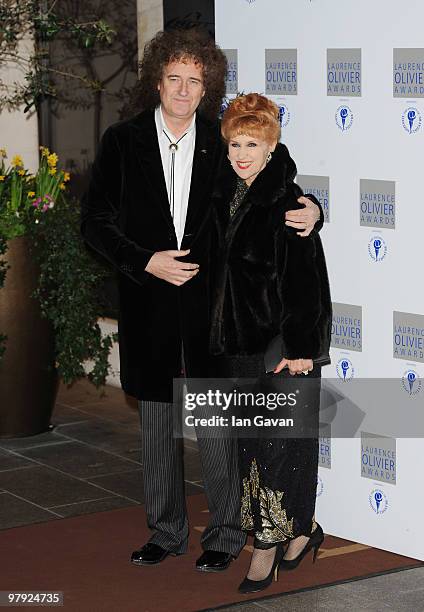 Brian May and Anita Dobson attend the Laurence Olivier Awards at The Grosvenor House Hotel, on March 21, 2010 in London, England.