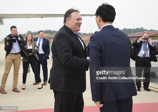 Secretary of State Mike Pompeo arriving at Osan Air Base, Republic of Korea, June 13, 2018. Image courtesy Airman 1st Class Ilyana Escalona / 51st...