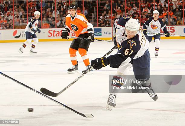 Maxim Afinogenov of the Atlanta Thrashers shoots on goal against the Philadelphia Flyers on his way to scoring at the Wachovia Center on March 21,...