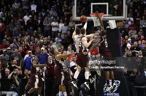 Chris Kramer of the Purdue Boilermakers shoots the game winning basket in overtime to defeat of the Texas A&M Aggies 63-61 during the second round of...