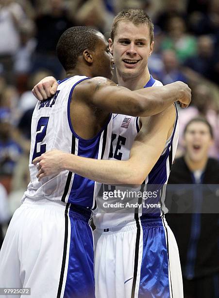 Nolan Smith and Jon Scheyer of the Duke Blue Devils celebrate in the game against the California Golden Bears during the second round of the 2010...