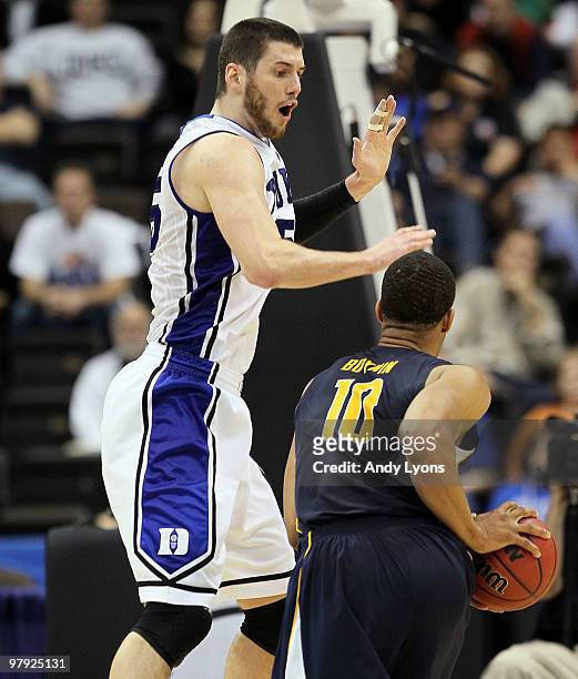 Brian Zoubek of the Duke Blue Devils defends Jamal Boykin of the California Golden Bears during the second round of the 2010 NCAA men's basketball...