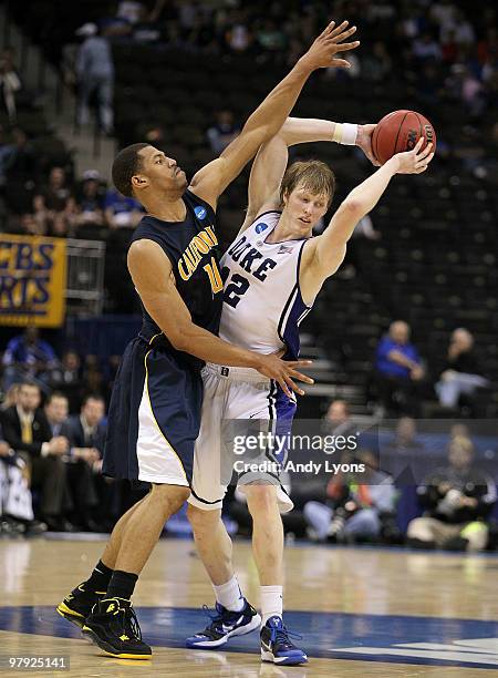 Kyle Singler of the Duke Blue Devils is defended by Jamal Boykin of the California Golden Bears during the second round of the 2010 NCAA men's...