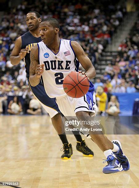 Nolan Smith of the Duke Blue Devils dribbles the ball against the California Golden Bears during the second round of the 2010 NCAA men's basketball...