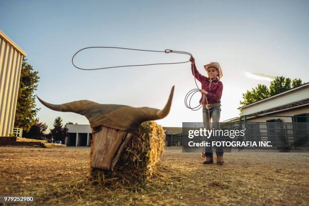 utah cowgirl with lasso - girls on bulls stock pictures, royalty-free photos & images