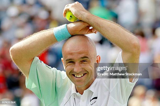 Ivan Ljubicic of Croatia celebrates match point against Andy Roddick during the final of the BNP Paribas Open on March 21, 2010 at the Indian Wells...