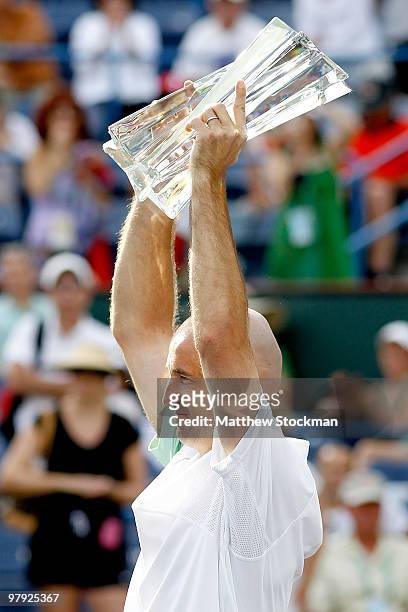 Ivan Ljubicic of Croatia celebrates his win over Andy Roddick during the final of the BNP Paribas Open on March 21, 2010 at the Indian Wells Tennis...