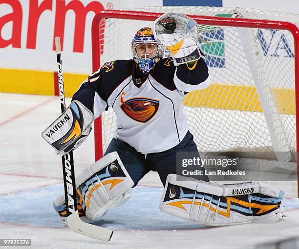 Ondrej Pavelec of the Atlanta Thrashers makes a glove save against the Philadelphia Flyers on March 21, 2010 at the Wachovia Center in Philadelphia,...