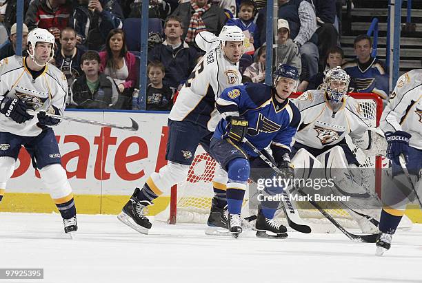 Shea Weber and Pekka Rinne of the Nashville Predators defend against Paul Kariya of the St. Louis Blues on March 21, 2010 at Scottrade Center in St....