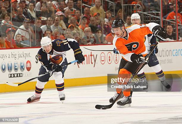 Jeff Carter of the Philadelphia Flyers skates down the puck against the Atlanta Thrashers at the Wachovia Center on March 21, 2010 in Philadelphia,...