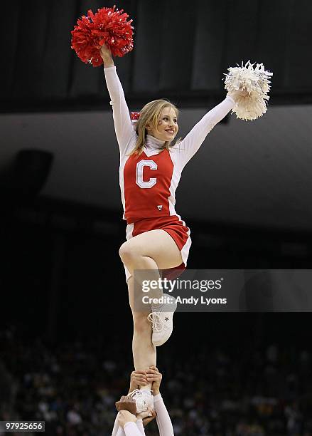 Cornell Big Red cheerleader is pictured in the game against the Wisconsin Badgers during the second round of the 2010 NCAA men's basketball...