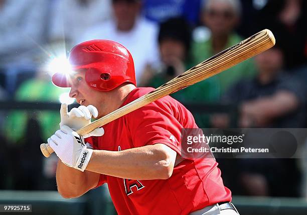 Robb Quinlan of the Los Angeles Angels of Anaheim bats against the Kansas City Royals during the MLB spring training game at Surprise Stadium on...