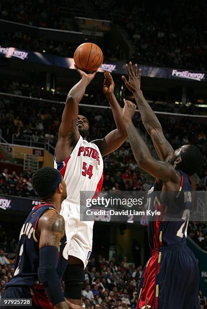 Jason Maxiell of the Detroit Pistons shoots the jumper over J.J. Hickson of the Cleveland Cavaliers on March 21, 2010 at The Quicken Loans Arena in...