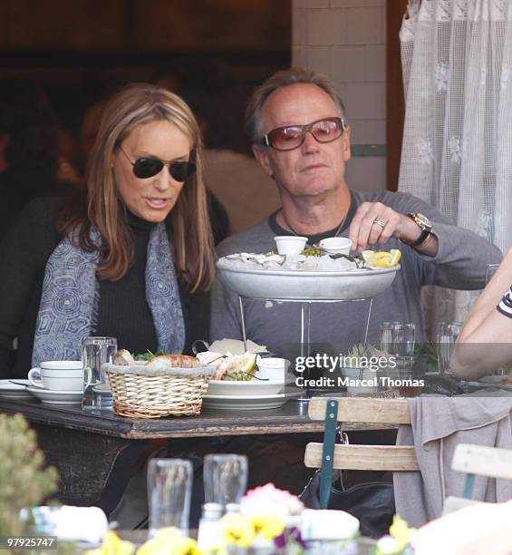 Peter Fonda and Parky DeVogelaere visit Pastis restaurant in the Meat Packing district on March 20, 2010 in New York City.