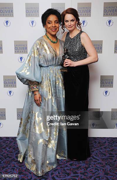 Ruth Wilson poses with her 'Best Actress in a Supporting Role' with presenter Phylicia Rashad during the Laurence Olivier Awards at The Grosvenor...