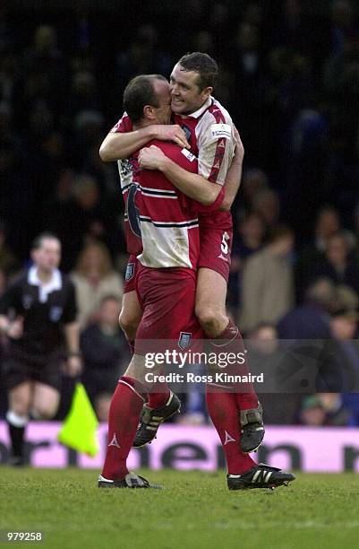 Jamie Bates and Paul McCarthy of Wycombe celebrate after beating Leicester City in the quarter final of the FA Cup after the Leicester City v Wycombe...