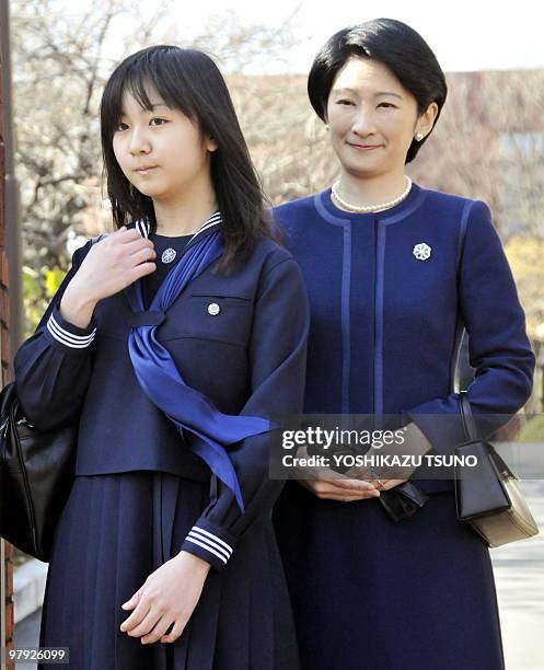 Japanese Emperor's second son Prince Akishino's daughrer Princess Kako smiles with her mother Princess Kiko as Kako graduates from the Gakushuin...