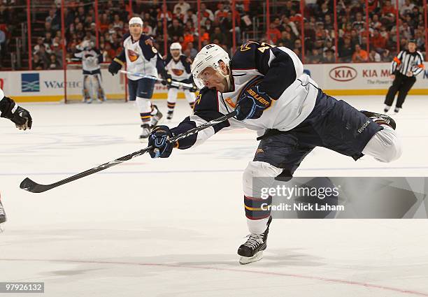 Rich Peverley of the Atlanta Thrashers scores the third goal against the Philadelphia Flyers on his way to scoring at the Wachovia Center on March...