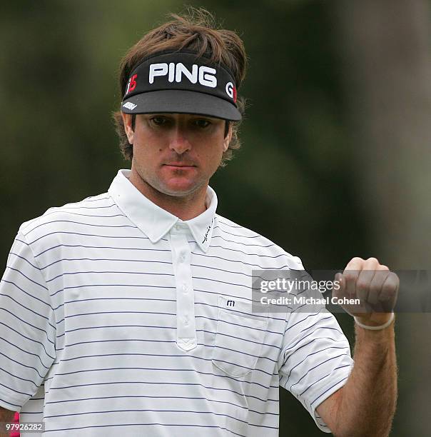 Bubba Watson makes a birdie putt on the 10th green during the final round of the Transitions Championship at the Innisbrook Resort and Golf Club held...