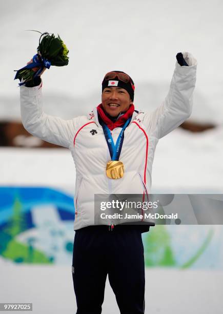 Gold medalist Yoshihiro Nitta of Japan celebrates at the medal ceremony for the Men's 1km Standing Cross-Country Sprint during Day 10 of the 2010...