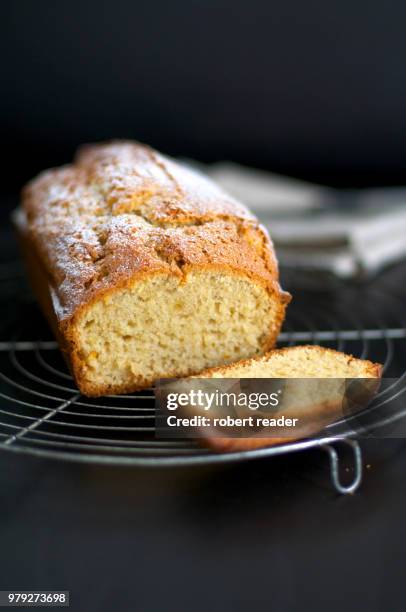 sponge madeira loaf cake on wire rack - yellow cake stock pictures, royalty-free photos & images