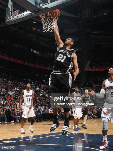 Tim Duncan of the San Antonio Spurs dunks against the Atlanta Hawks on March 21, 2010 at Philips Arena in Atlanta, Georgia. NOTE TO USER: User...
