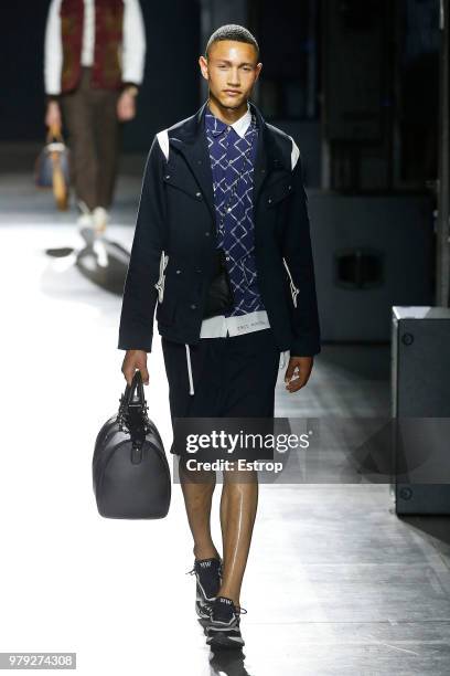 Model walks the runway at the Hunting World show during Milan Men's Fashion Week Spring/Summer 2019 on June 18, 2018 in Milan, Italy.