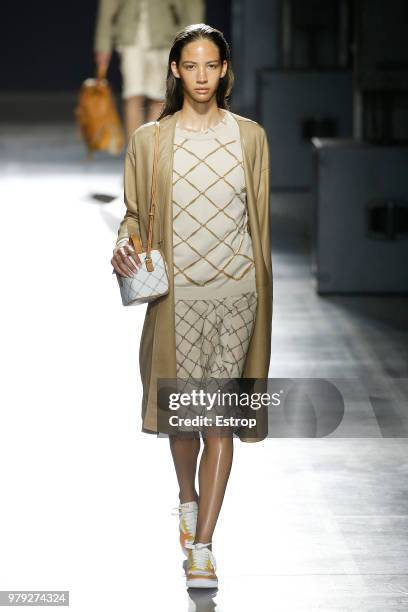 Model walks the runway at the Hunting World show during Milan Men's Fashion Week Spring/Summer 2019 on June 18, 2018 in Milan, Italy.