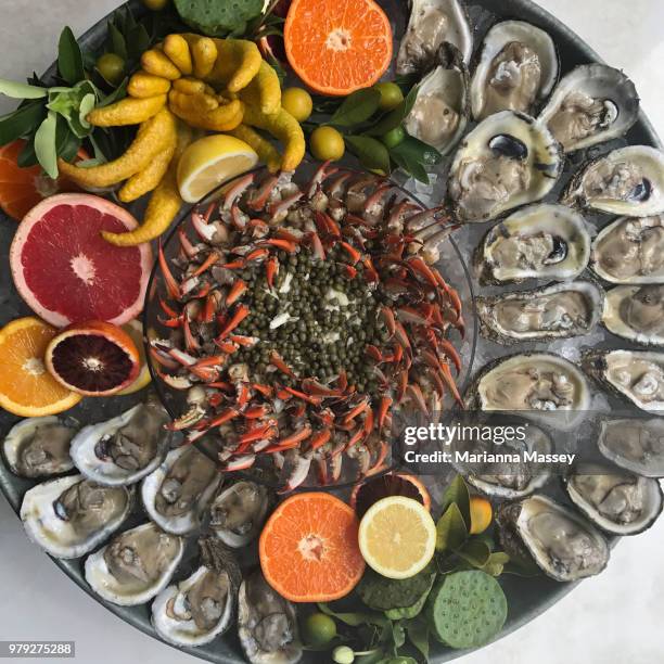 fresh seafood served on a platter - seafood platter stock pictures, royalty-free photos & images