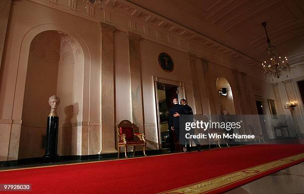 President Barack Obama and Vice President Joseph Biden put their arms around each other after Obama spoke from the East Room of the White House after...