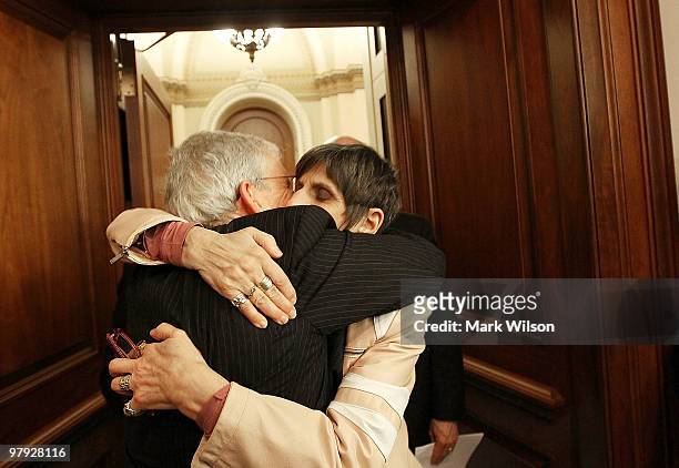 Ron Pollack of Families USA, hugs Rep. Rosa DeLauro after the House passed the health care vote on Capitol Hill on March 22, 2010 in Washington, DC....