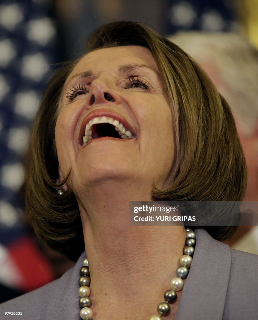 US House Speaker Nancy Pelosi laughs dur