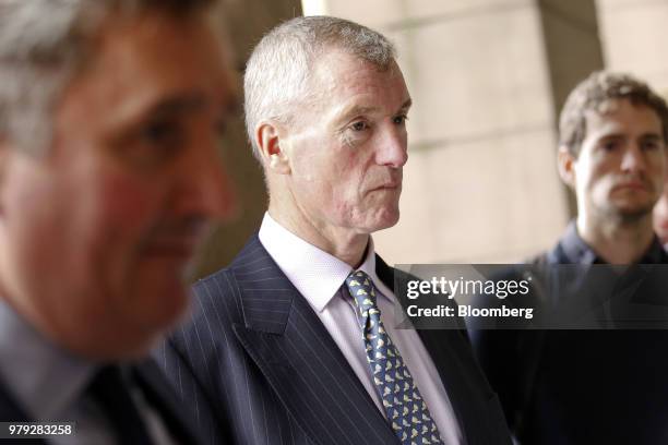 Chris Brown, sustainable business director at Asda Stores Ltd., center, arrives for a Department for Environment, Food and Rural Affairs committee...