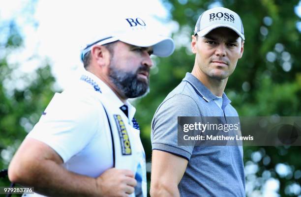 Martin Kaymer of Germany looks on with his caddie Craig Connelly during a practice round ahead of the BMW International Open at Golf Club Gut...