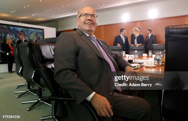 Economy and Energy Minister Peter Altmaier arrives for the weekly German federal Cabinet meeting on June 20, 2018 in Berlin, Germany. High on the...