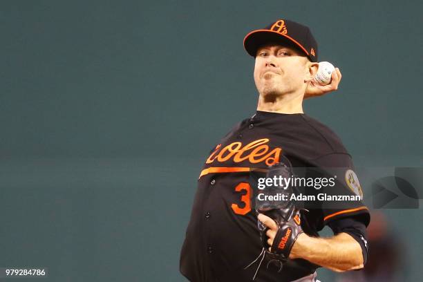 Chris Tillman of the Baltimore Orioles pitches in the first inning of a game against the Boston Red Sox at Fenway Park on April 13, 2018 in Boston,...
